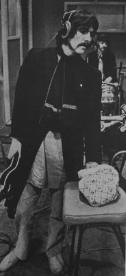 A bag of candy for George is as much a staple as electric guitars at Beatle recording sessions. 